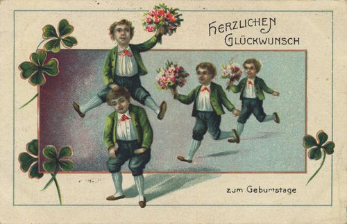 4 Jungen mit Blumen und Glcksklee