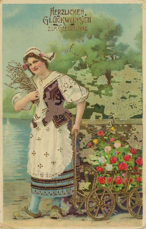 Frau mit Blumenwagen